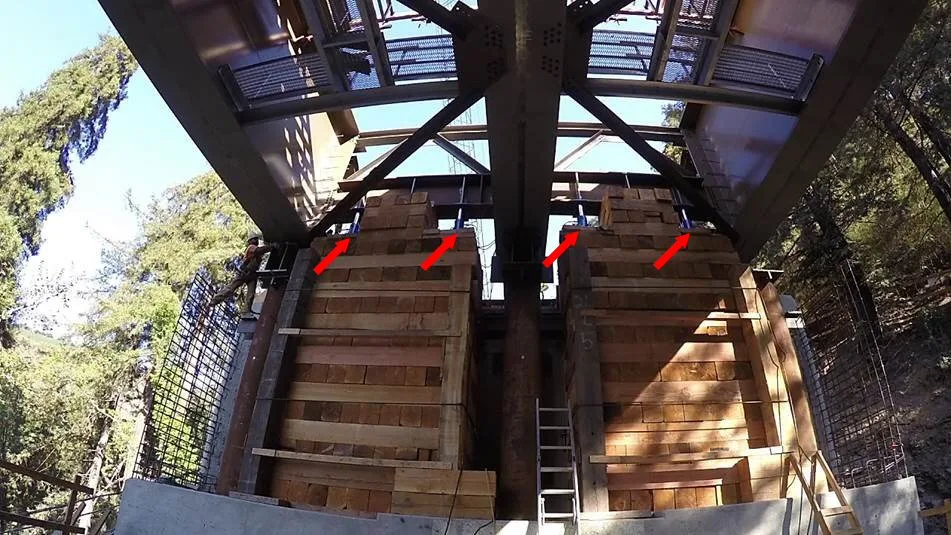 Bridge positioned over 15’ high stacks of 12 x12 dunnage