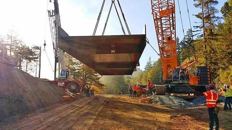 30 foot sections of the steel girder were bolted together